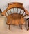 Stunning pair of vintage 1970s Ethan Allen pub-style captain's chairs from the iconic Heirloom Collection. Crafted in the...