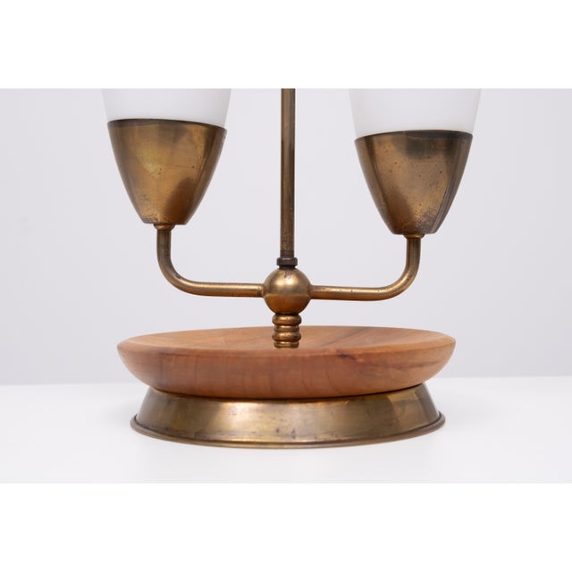 Very nice table lamp . Teak with Brass details ,comes with Two Opaline Glass shades . All original and good condition ....