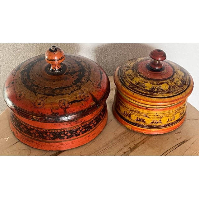 What beautiful examples of Central Asian craftsmanship. The two hand-turned spice boxes. The type of boxes were often used...