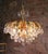 Beautiful cascading gilt brass leaf crystal chandelier made by Palwa, Germany in the 1960s. Original wiring takes 8 small...