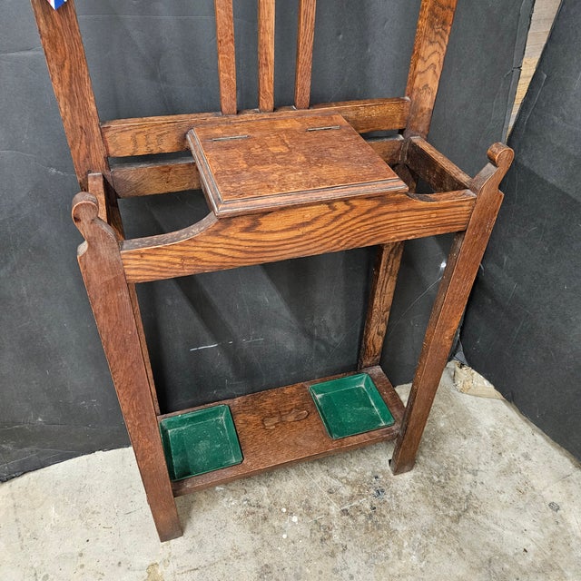 Oak Arts and Crafts Hallstand With Mirror and coat/hat hooks.