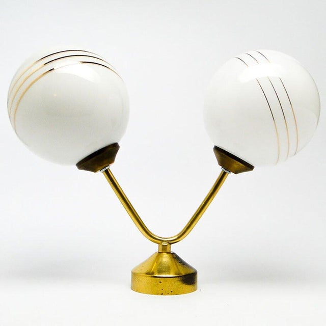 Wall lamp from the 60s The lamp has two light points, it can also be mounted as a ceiling lamp. Lampshades made of glass,...
