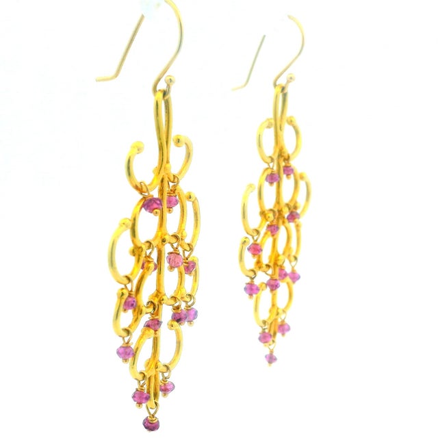 A beautifully fluid pair of vintage Italian chandelier earrings crafted in 18K yellow gold, dating to the 1970s. Designed...