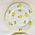 These are a set of 4 delightful Dessert Plates from the 1950s. They feature scattered dainty yellow roses and a scalloped...