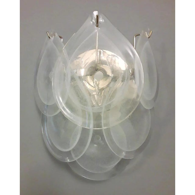 Pair of Italian wall lights with vintage teardrop shaped Murano glasses hand blown with small bubbles inside using...