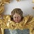 Gilded Mirror with Cherub, 1800. The square frame is surmounted by the head of a winged cherub, framed by a rich garland...