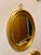 Vintage Oval Italian Giltwood Mirror With Brass Loop Finial For Sale In New York - Image 6 of 11