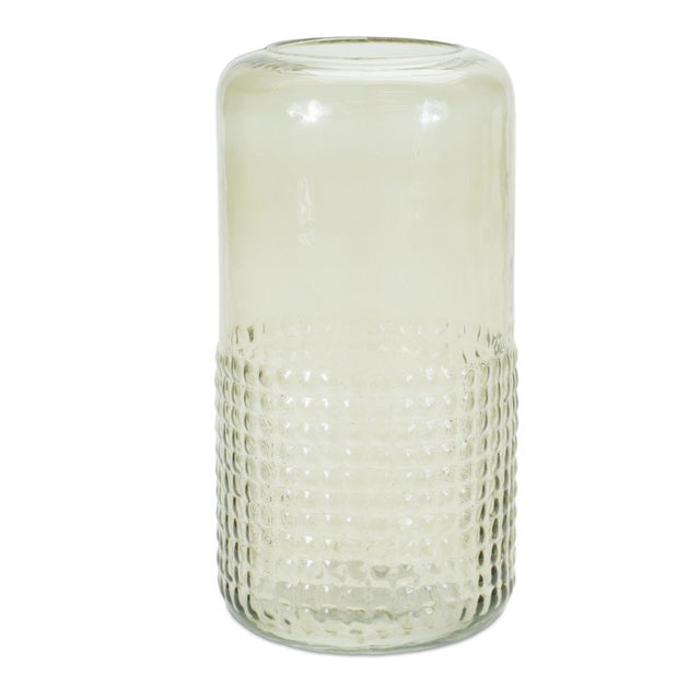 Add a touch of modern elegance to your home with the Green Textured Glass Candle Holder Vase. Featuring a clear sage green...