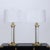 A pair of Lucite and Brass Column Table Lamps. Brass re-finished and newly re-wired. Circa 1950. Base: 8.5"Dia Lamp...