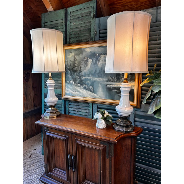 This is a stunning pair of vintage lamps by Honi Chilo — a beautiful blend of classic materials and timeless design....