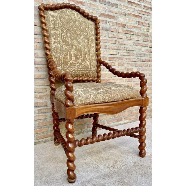 Original cherry wood armchair following the structure of the Louis XIV armchairs. Late 19th Century Hand-Carved Walnut...