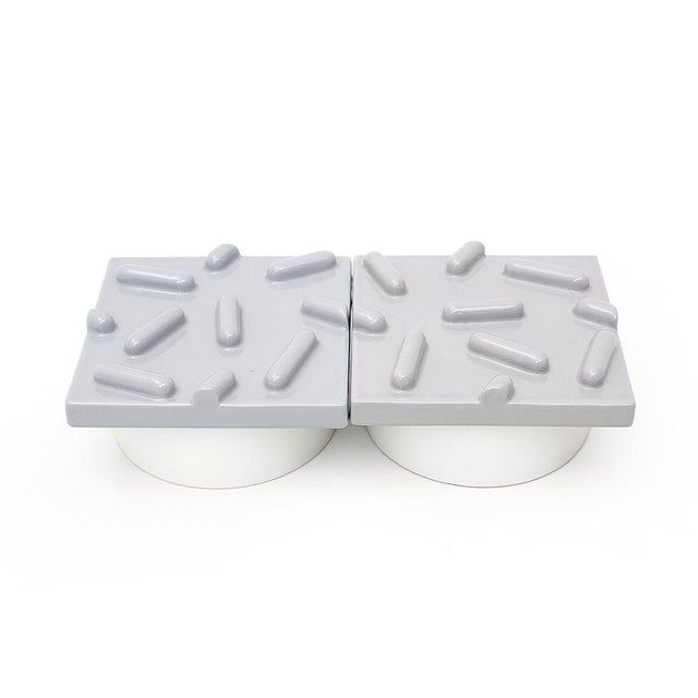 Pair of containers produced in the 1980s by MAS of Florence based on a design by Luigi Castaldi and Massimo Materassi. The...