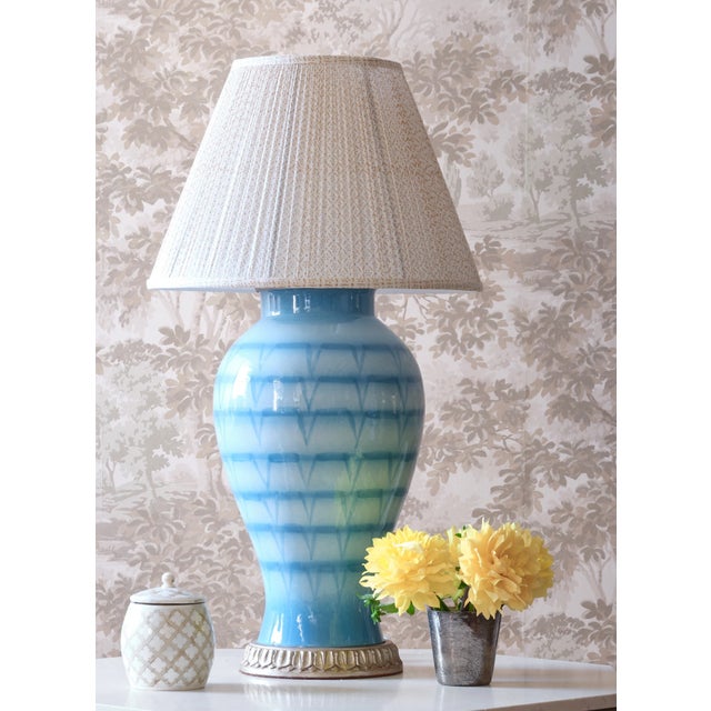 18" x 9" x 13" Slope Crafted from Handblocked fabric, slightly shirred.