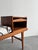 This elegant Scandinavian gossip bench from the 1960s is a beautiful example of functional Mid-Century Modern design....