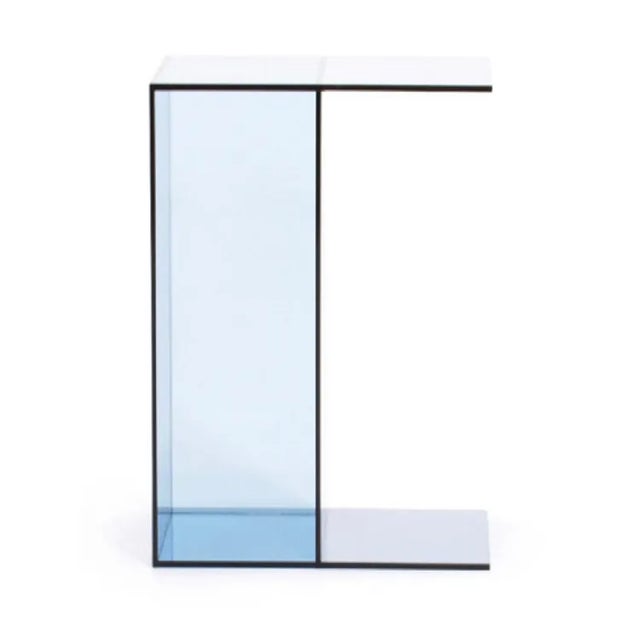 Our lucite transparent blue side table is shape-shifting piece and can be used any room. Dimensions : 18''W x 10''D x...