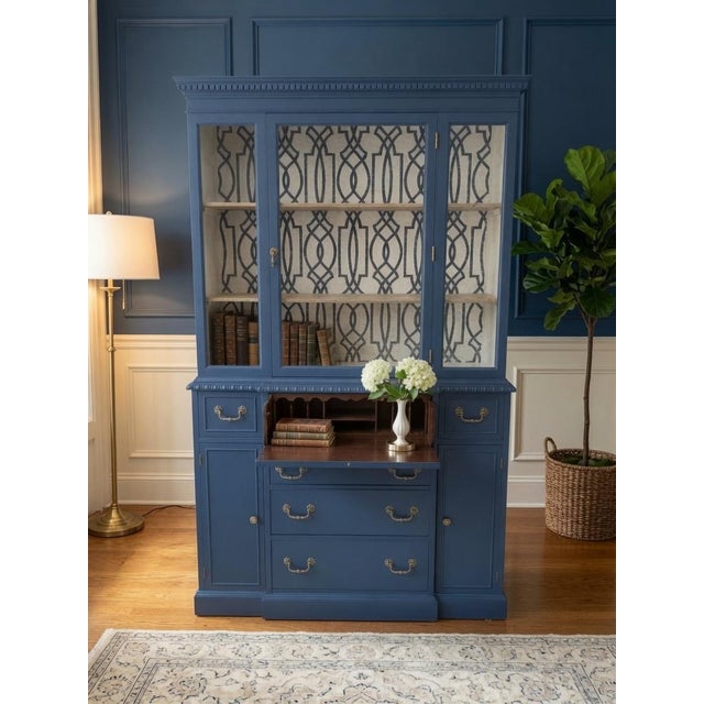 This commanding traditional secretary desk with hutch has been expertly refinished in a sophisticated deep navy blue,...