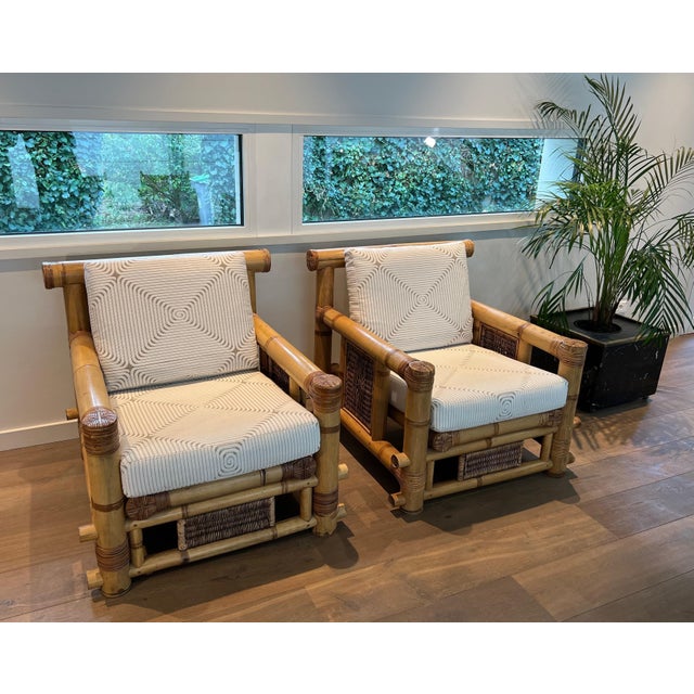 This very important and decorative pair of armchairs is made of bamboo with beautiful Pierre Frey cushions. This is a...