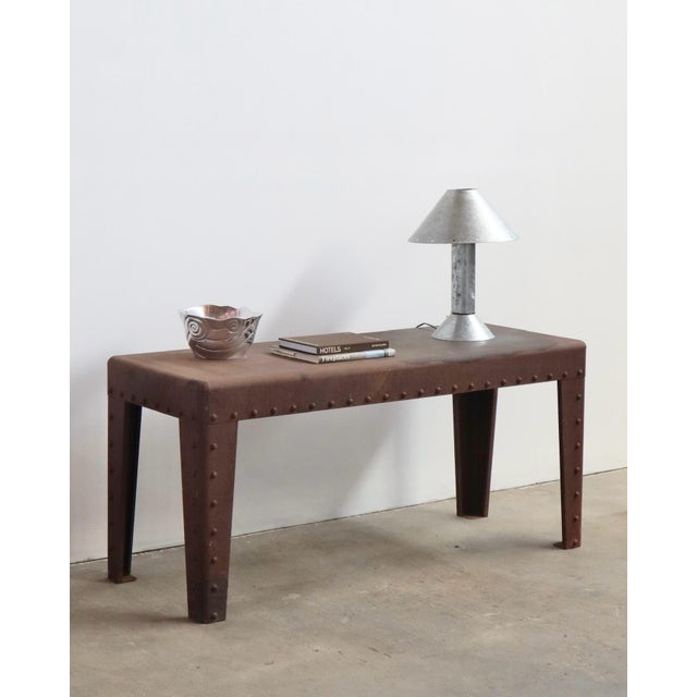 1990s oakley display table heavily patinaed console table, originally used in one of oakley’s stores in the 1990s 56” w...