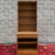 A vintage Ethan Allen Heirloom Nutmeg Maple Custom Room Plan collection 2 piece wall unit consisting of an open base...
