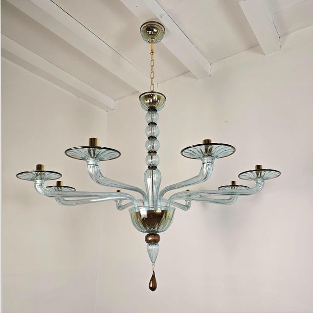 Light blue Mid Century Modern Murano glass chandelier, Barovier and Toso style, Italy 1980s. The handmade Murano glass...