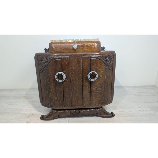 Art Nouveau Oak Sideboard with Marble from the 1920s/30s Stylish marble and oak sideboard, an Art Deco-style cabinet. The...