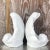 A fabulous pair of large vintage clam shells. A chic pair of ceramic shells in a glazed white finish. Can be used as a...