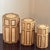 A beautifully handcrafted set of three graduated octagonal nesting boxes featuring split bamboo framing and handwoven...