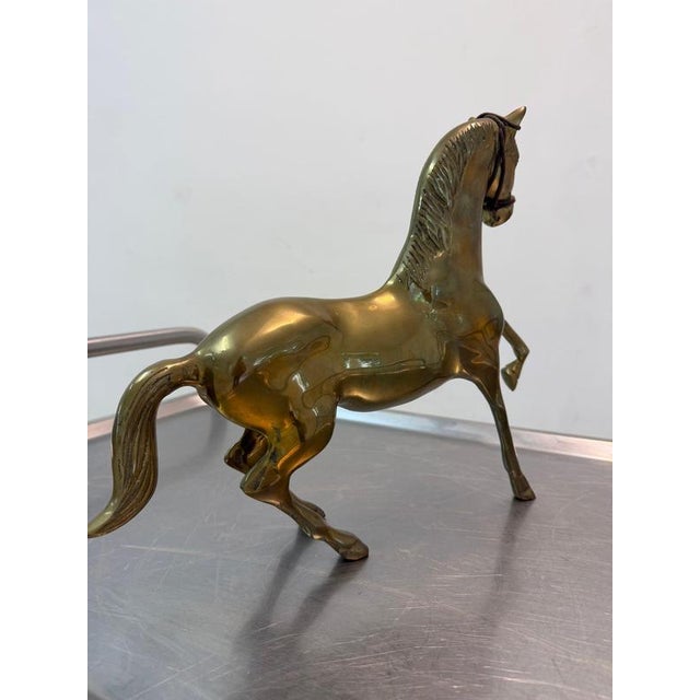 An impressive find for collectors: This large horse, crafted from solid brass, brings the majestic power and dynamism of...
