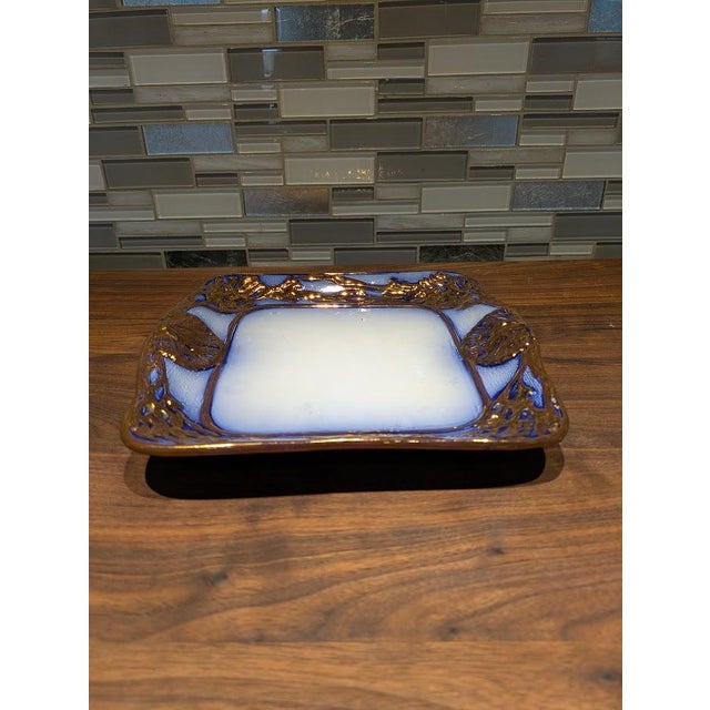 A gorgeous and highly collectible piece of late 19th-century Victorian dinnerware, this Staffordshire square serving plate...
