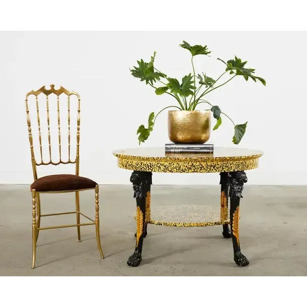 Whimsical French empire style coffee cocktail table lacquer speckled by artist Ira Yeager (American 1938-2022). The oval...