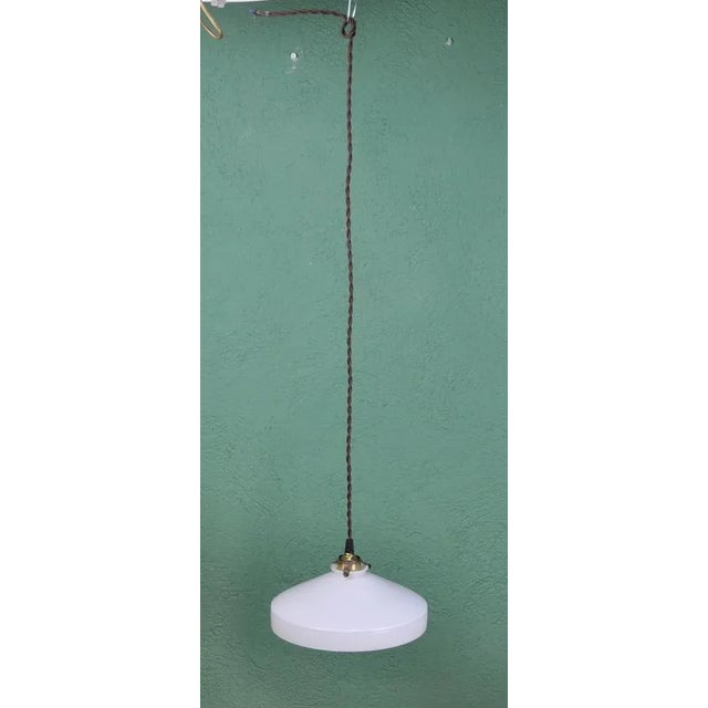 White Opaline Lamp, 1920s, in Very Good conditions. Designed 1920 to 1949 Up to 250V (Europe/UK Standard).The wiring of...