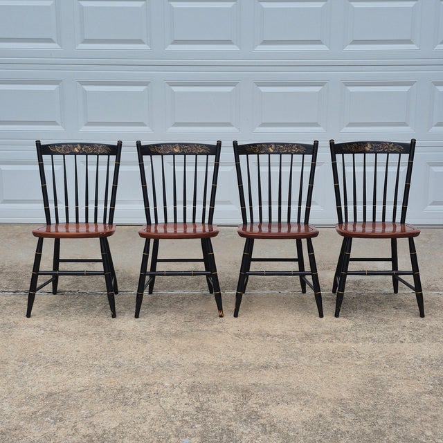 This set of 4 Hitchcock windsor dining chairs is a traditional American classic. The chairs are dated 2001 and marked...