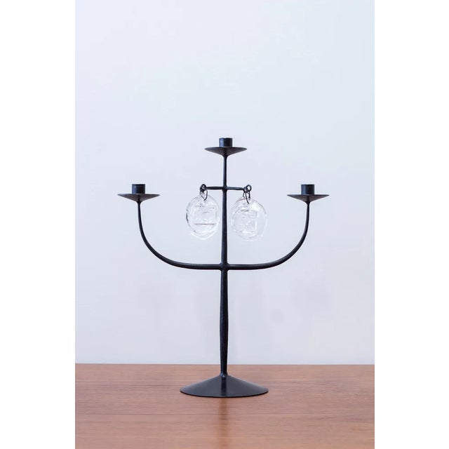 Three armed candelabra designed by erik höglund. Hand made during the 1950s by boda smide in sweden. Wrought iron and mold...