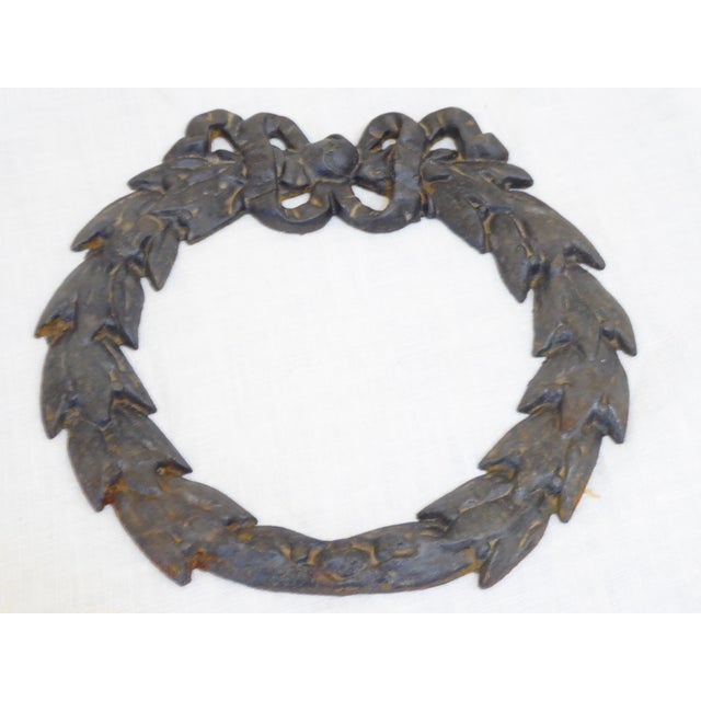 This iron architectural effect is 9.25"H x 9"W.