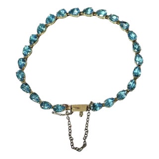 Tennis Bracelet With Pear-Shaped Blue Topaz Gemstones, 14k Gold For Sale