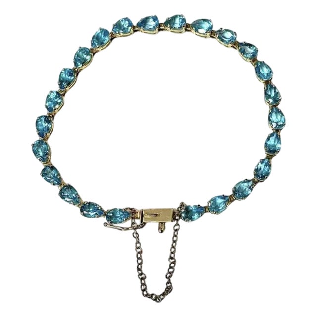 Tennis Bracelet With Pear-Shaped Blue Topaz Gemstones, 14k Gold For Sale