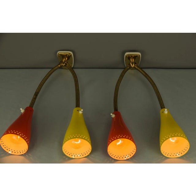 Two sconces by J.T.Kalmar from around the 1950s. Original condition, though the shades have been repainted. On, Off switch...