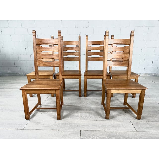 Dimensions: H 45” x W 18.5” x SD 17.3” x SH 17.5” Set of 6 Brutalist Dutch ladder back oak dining chairs. Sides of the...