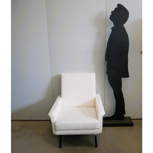 CODE 2387 Restored 1960s armchair. Italian modernism Completely restored 1960s armchair. Vintage Black painted iron base,...