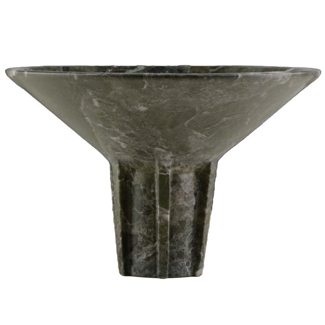 Handcrafted from richly veined green marble, the Navire Bowl features a broad sculptural basin elevated on a strong...