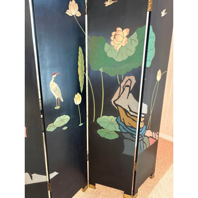 1960s-70s asian-style black lacquered/gilt 2-sided bird screen w/ brass feet detail. Excellent condition. Measures 72"...