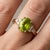 Elegant Peridot & Diamond Accent Ring – August Birthstone This exquisite ring showcases a vibrant peridot gemstone,...