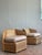 Embrace the epitome of relaxed sophistication with this exceptional pair of vintage lounge chairs by the renowned American...