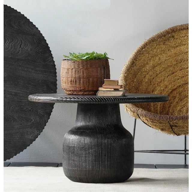 New special order item. Not vintage. The Cody Coffee Table is made from acacia wood that is textured with ridges and...