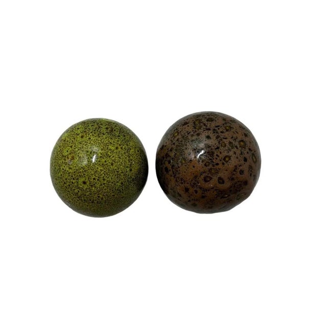 This set of six hand painted splatter design ceramic decorative spheres deliver fluid, playful and versatile style to any...