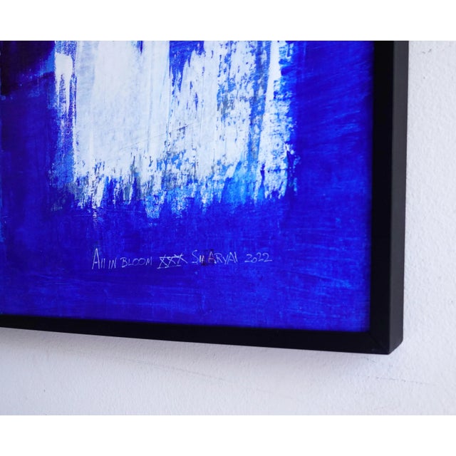 Stunning shades of blue are contrasted with a twist in this one-of-a-kind 42X46“ heavyweight canvas painting. It comes...