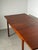 Elegant extendable teak dining table by white & newton , a fine example of british mid-century modern design from the...