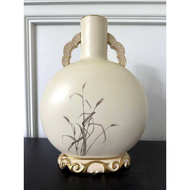 A large and rare porcelain vase with striking pictorial decoration by Royal Worcester dated 1888 and decorated by Charles...