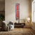This vibrant, vertically oriented wall hanging features traditional textile craftsmanship, beautifully combining a central...