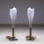 Pair of petite table lamps featuring white Murano glass shades in a teardrop design, complemented by nickel-plated bases....